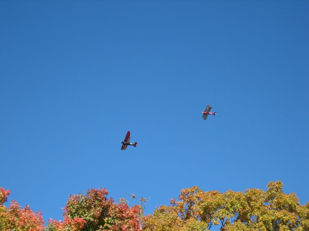 Being near the Airodrome, the biplanes with biplane rides printed under their wings flew overhead